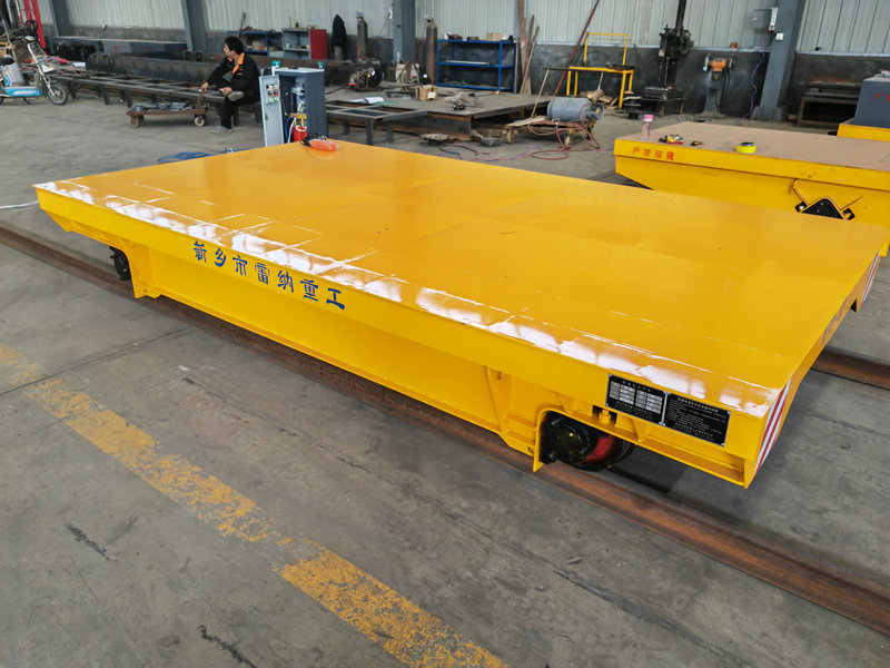 פתרון תחבורה תעשייתית Low Voltage Rail Transfer Trolley
